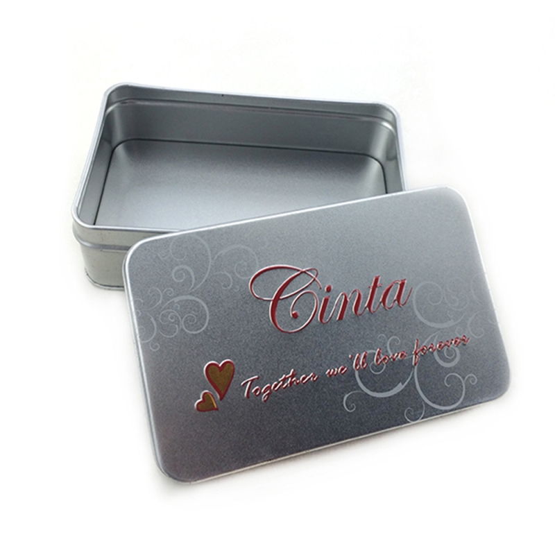 Räätälöity hopealakka suorakulmainen kosmeettinen tina-laatikko, jossa on kohokuvioitu logo